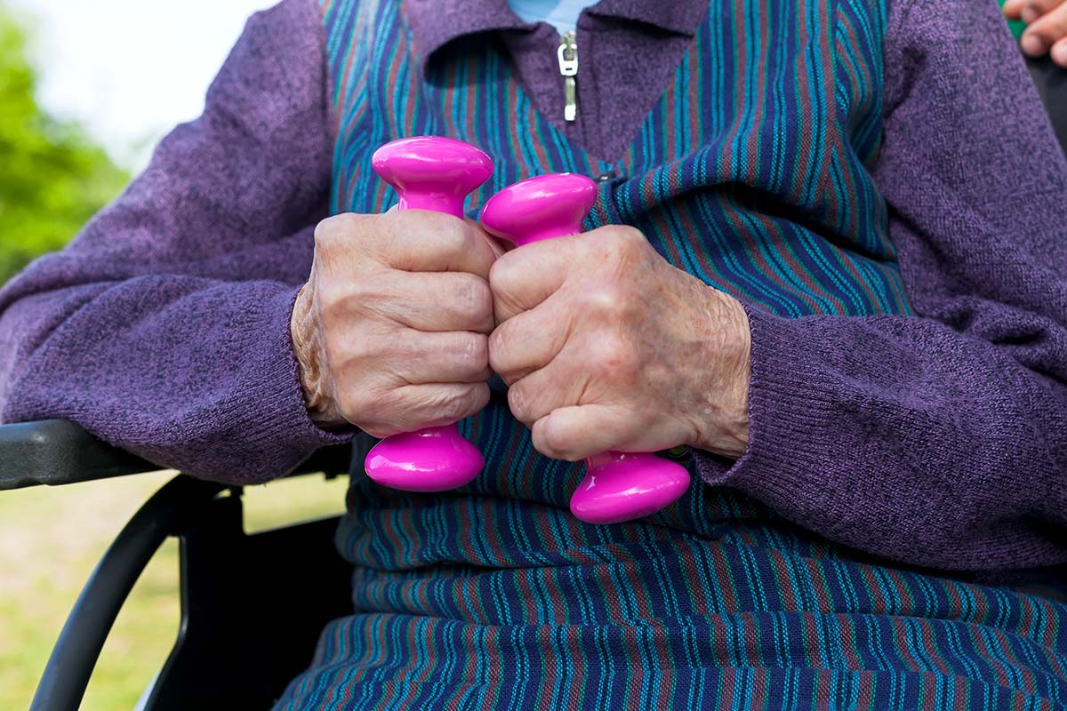 Senior doing light exercises