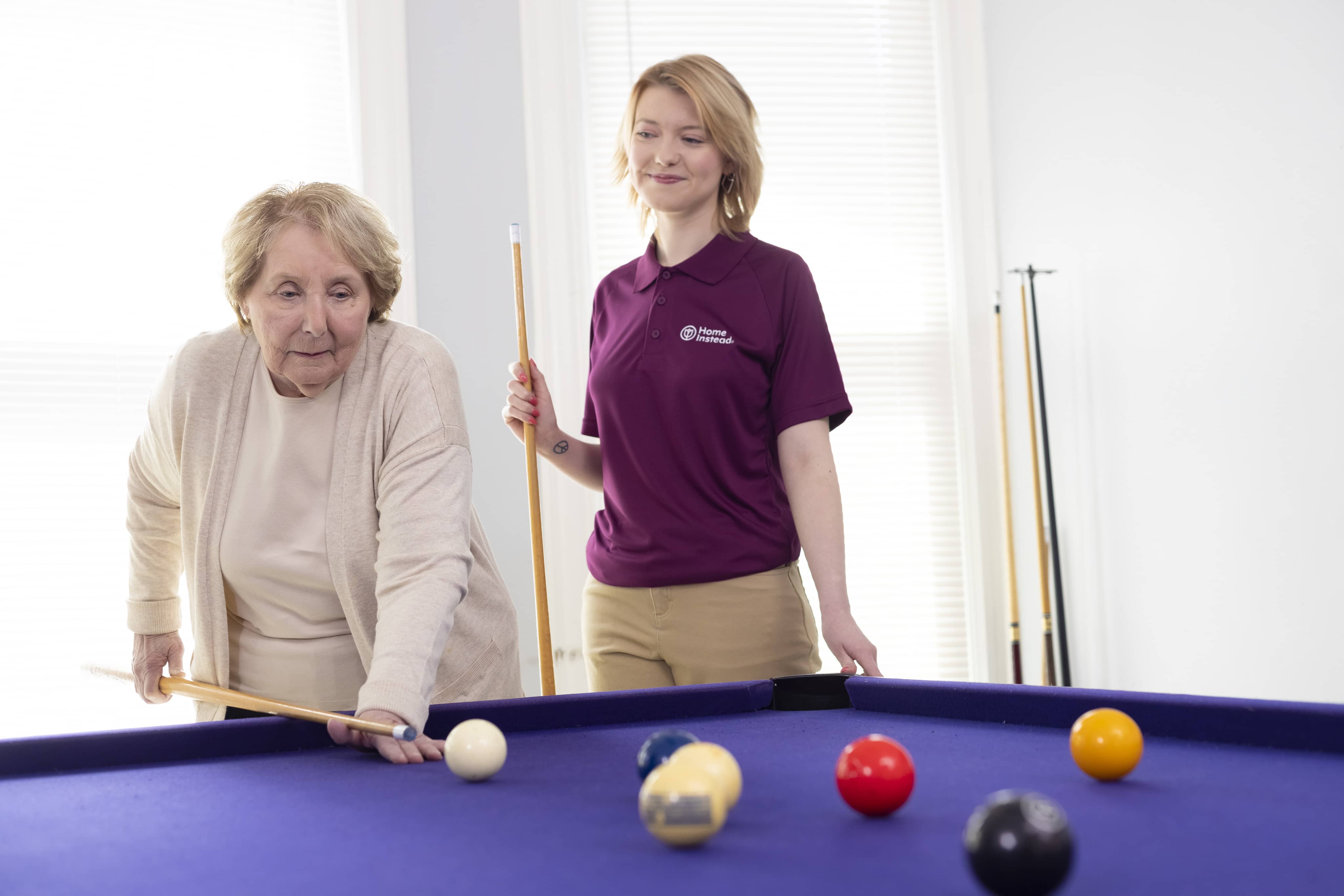 Home Instead Care Pro and Respite Care Client Playing Pool 1 