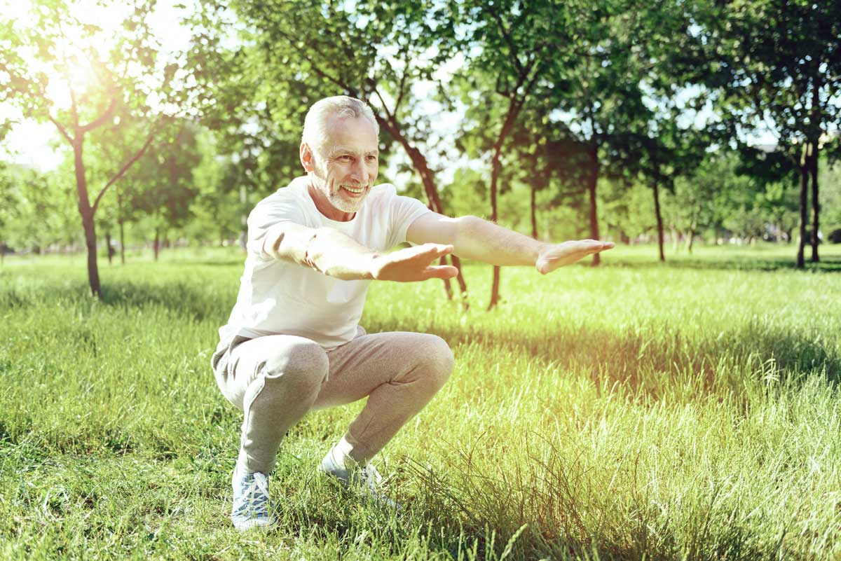 Senior exercising at the park