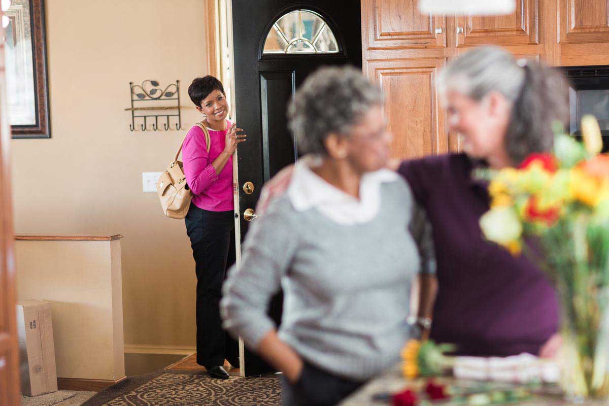 Daughter having a respite as a professional Caregiver takes care of mom