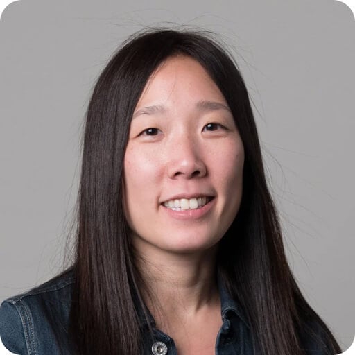 Sandy Jen, Co-founder of Honor, smiling confidently in a professional headshot, emphasizing her role in strategic innovation and leadership.